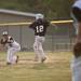 Pioneer junior pitcher Dan Olson throws to first for an out during a double header against Saline on Monday, May 20. Daniel Brenner I AnnArbor.com